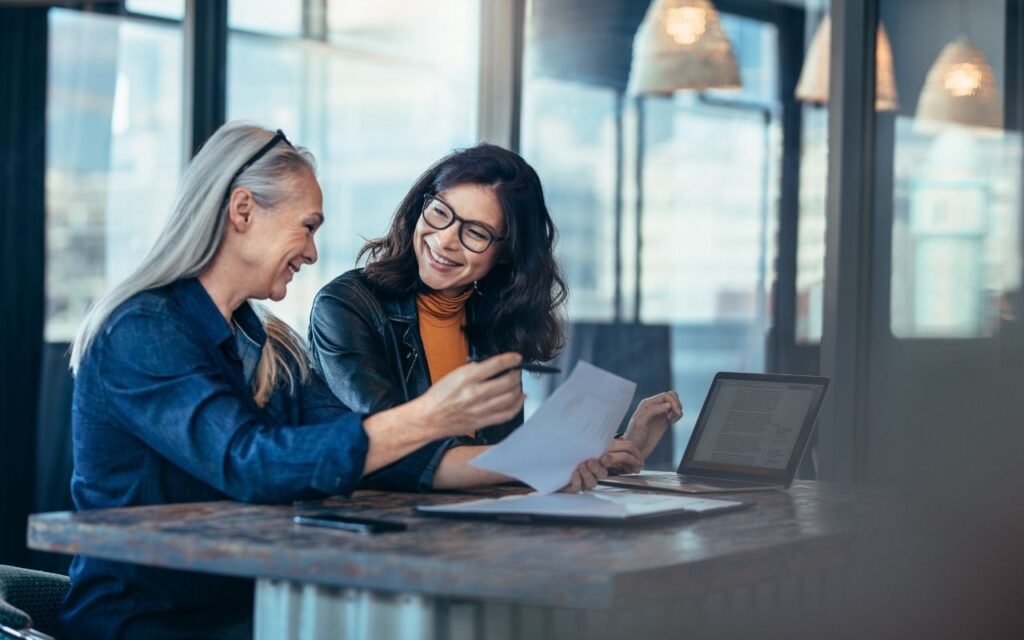 A financial coach and her client discuss how to repair her credit.