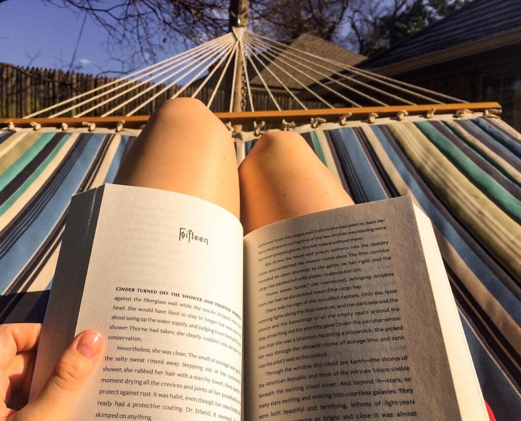 Woman reading in a hammock