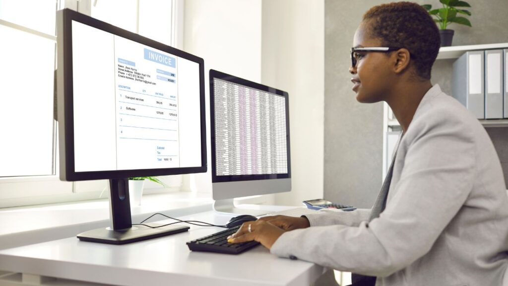 A bookkeeper sending invoices to a client's customers.