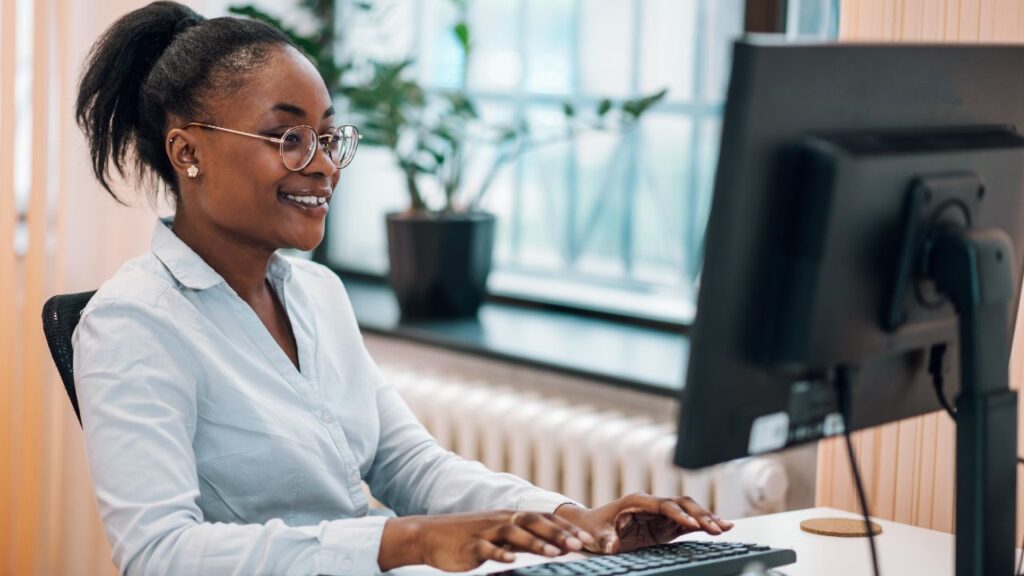 Woman studying for continuing education using her 529 plan.