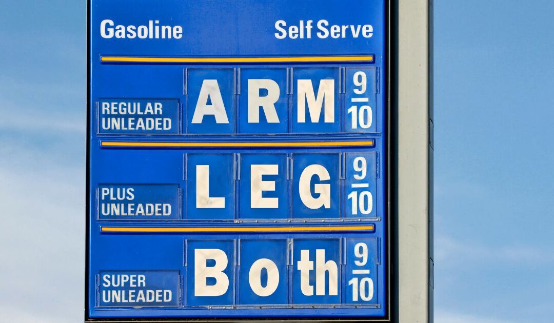 Gas station sign altered to list "Arm, Leg, Both" as gas prices.