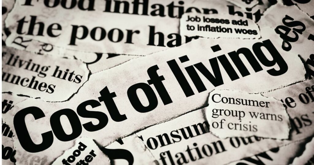Newspaper clippings talking about the cost of living, job losses, inflation and the affordability crisis.